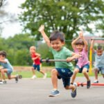 Kids exercising with various types of equipment.