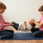Children performing myofunctional therapy exercises